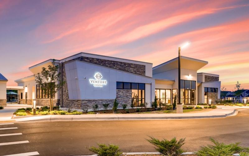 a building with a parking lot