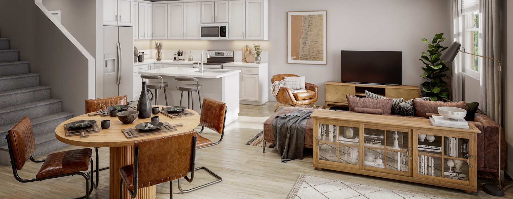 a kitchen and living room, couch, table and chairs